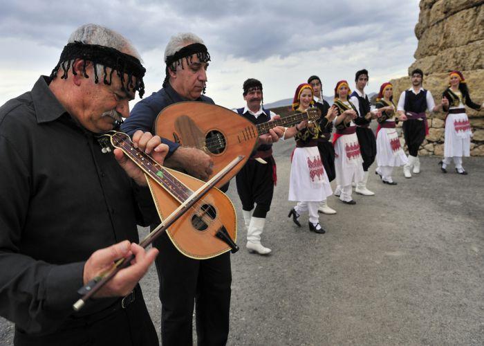 Greek folk dancing crew and musicians T photography shutterstock