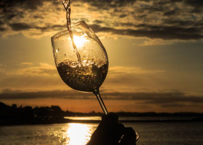 wine glass sunset Alfira shutterstock