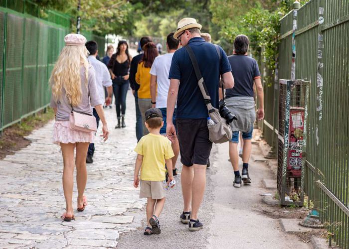 Family walking towards Acropolis