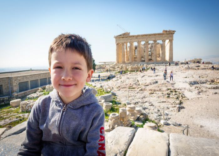 kid at the acropolis shipfactory shutterstock