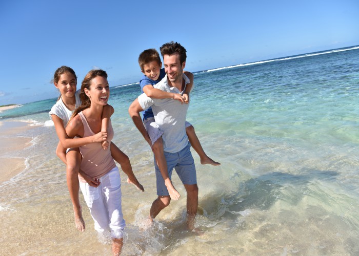 family in greek beach