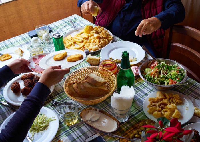 greek dinner table Ron Zmiri shutterstock compressed