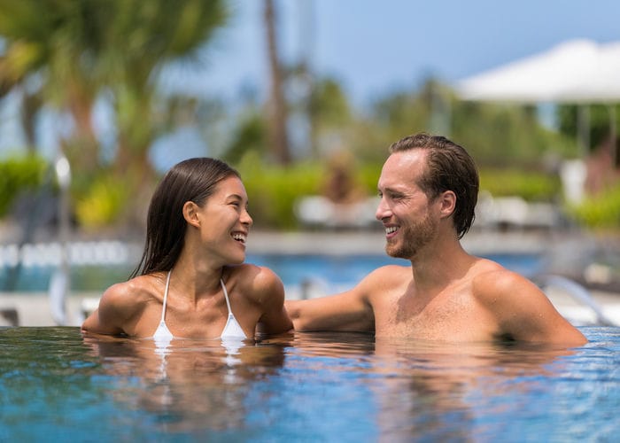 happy couple in pool