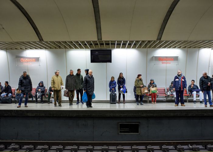 People waiting at Athens tube station markara shutterstock
