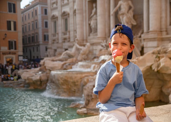 kid eating ice cream in rome