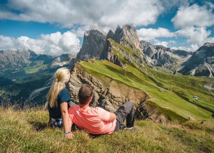 couple on dolomites hill