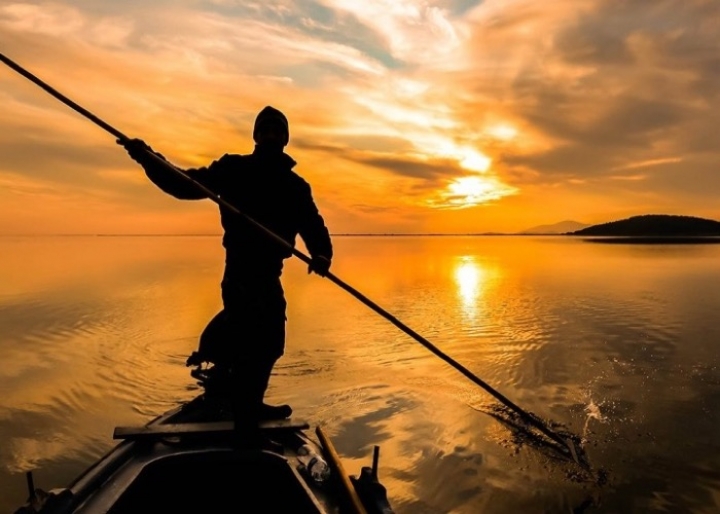 Fisherman in the lagoon of Messolonghi - credits: www.malloryontravel.com